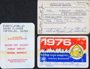 Group image of 1968 draft card, a 1974 library card, and a national park admissions card.