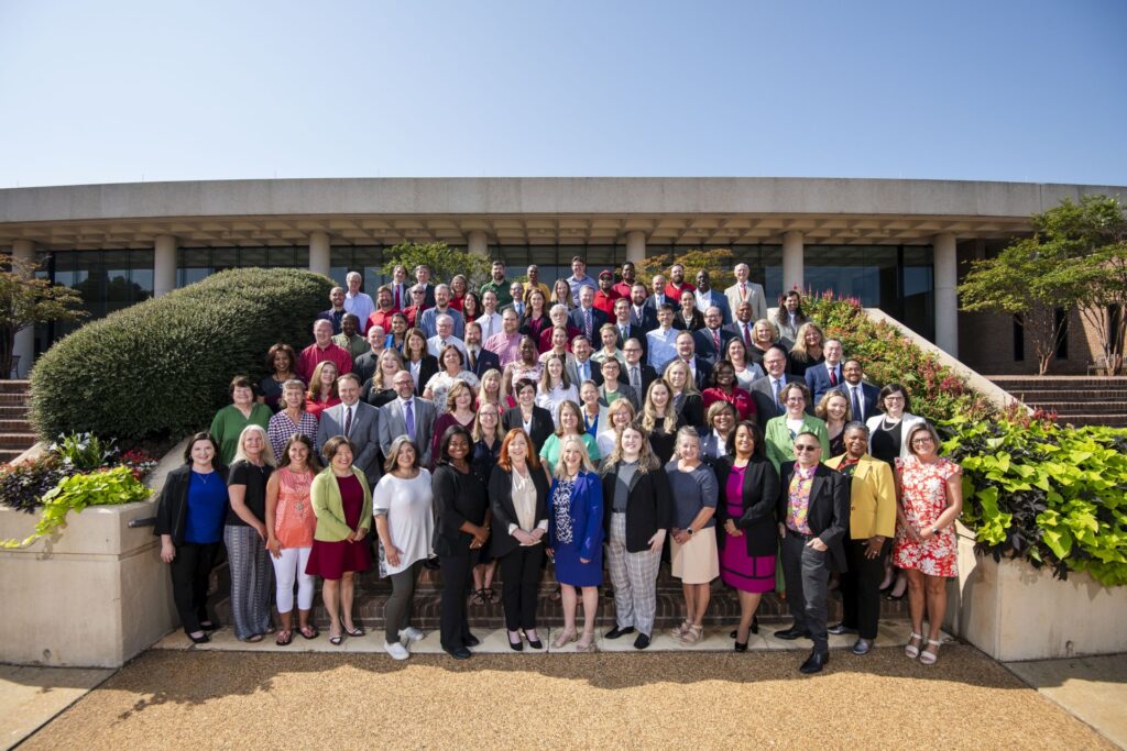 Faculty & Staff group photo on steps outside Alabama Law