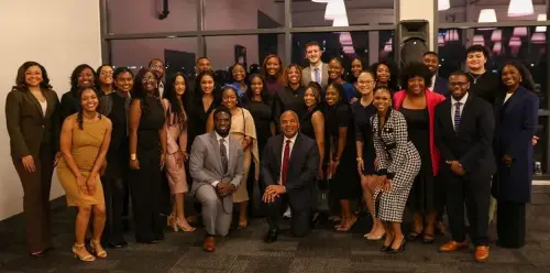 Professor Bryan Fair posese with the 2023-Alabama Law BLSA Chapter at the 2024 BLSA banquet.